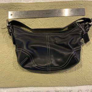 Coach 9541 Soho Mini Hobo black classic leather bag w/ white stitching.